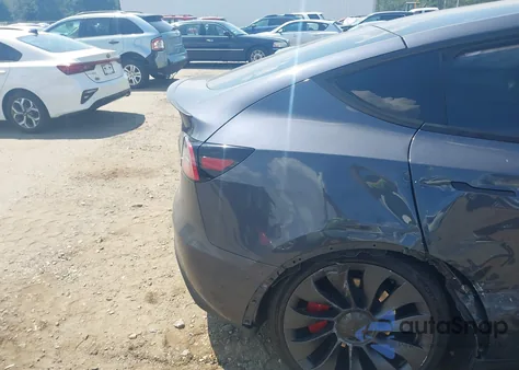 2023 Tesla Model Y Performance Dual Motor All-Wheel Drive z USA, uszkodzony, nr VIN 7SAYGDEF9PF614739